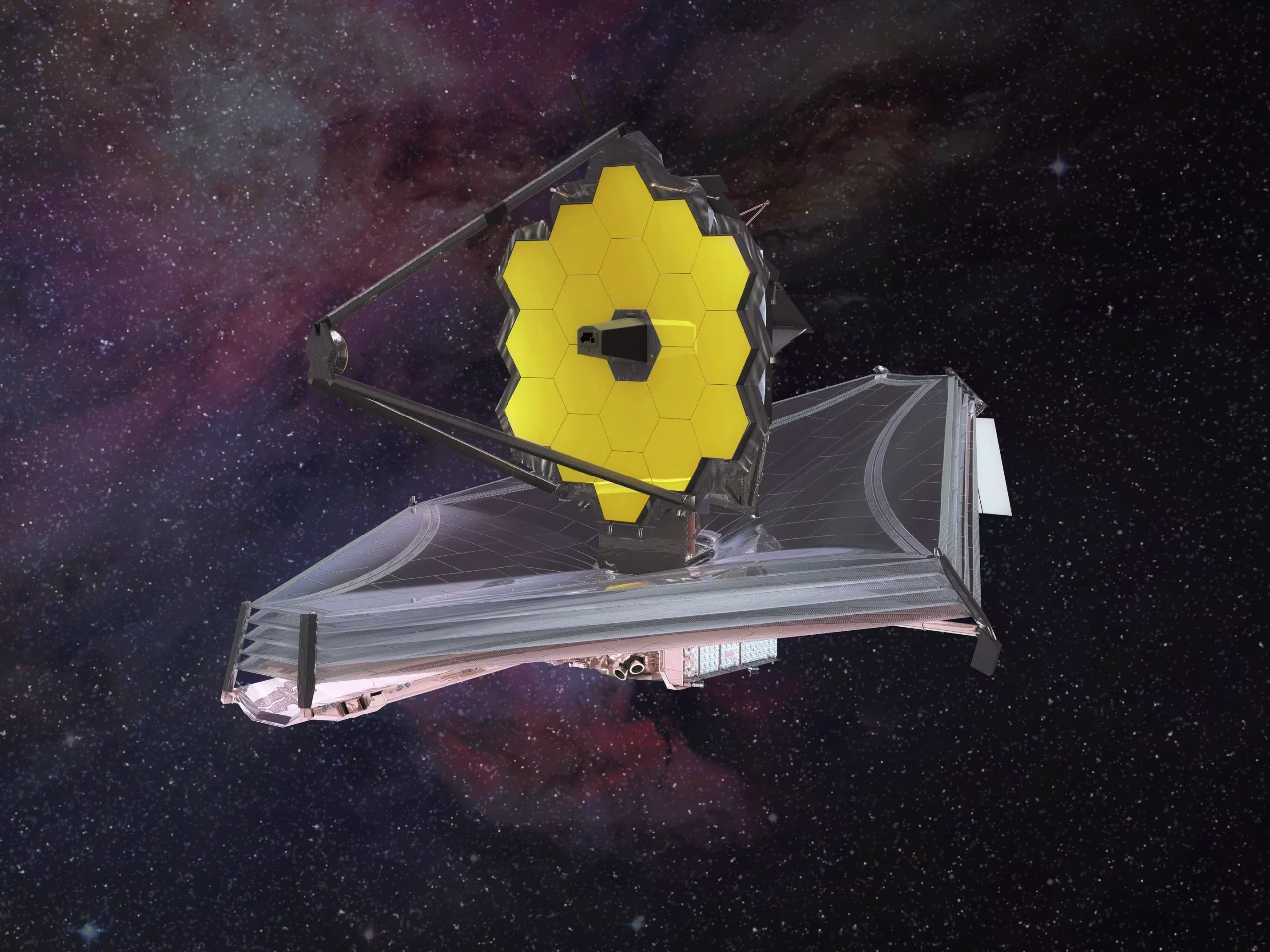 The James Webb Space Telescope, 2021 — 18 gold-coated beryllium segments forming a single 6.5 m mirror, behind a tennis-court-sized sunshield, parked at the L2 Lagrange point.